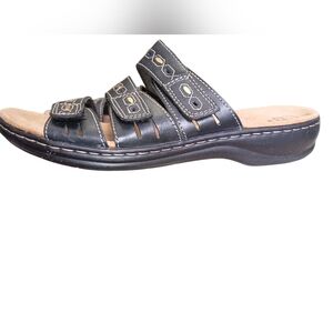 Clarks Black and Tan "Leisa Broach "Leather Sandals in-box.